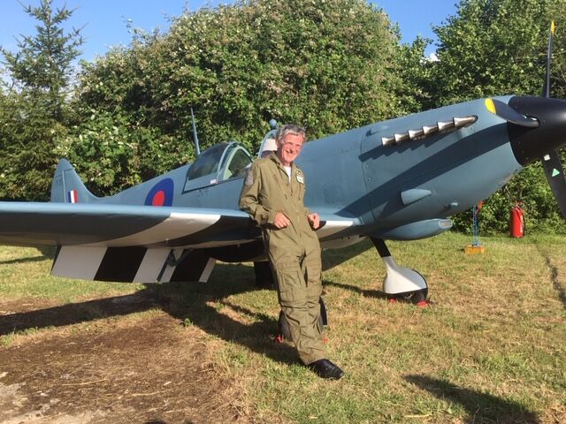 Steve Markham stood in front of his Spitfire replica