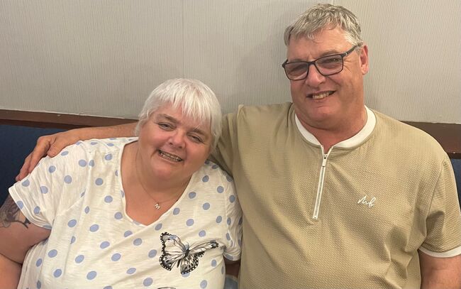 Beneficiary and her husband