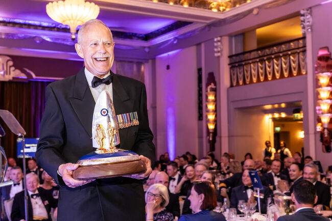 Supporter holding Fund award