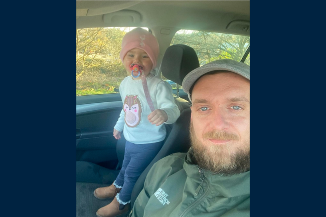 Beneficiary Kieran Head with his daughter