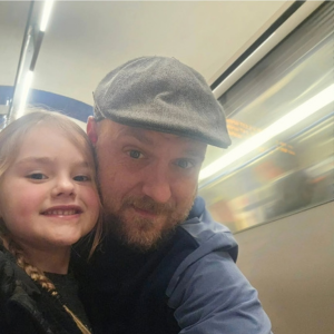 Fund beneficiary Kieran Head and his daughter.