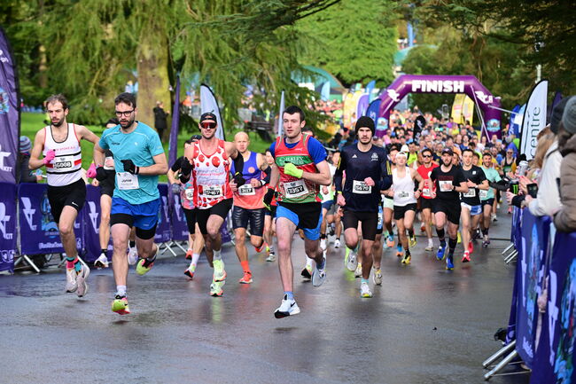 An image of runners taking off from the start line at a Run Alton Towers event in 2024