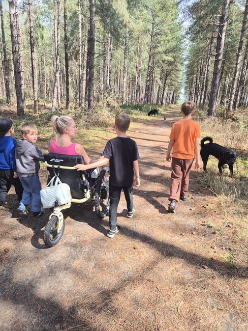 Bobbie and children in woods