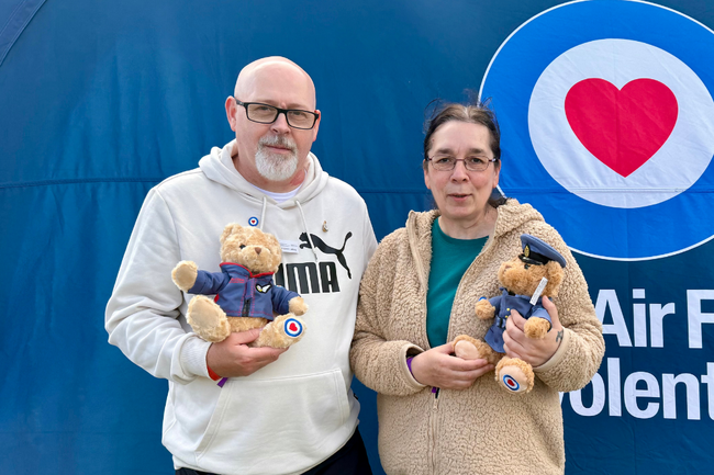 James and Claire holding Fund teddy bears at the Ayr Show