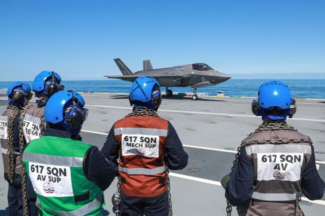 John in front of F-25