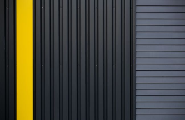 Black and yellow cladding on a commercial building