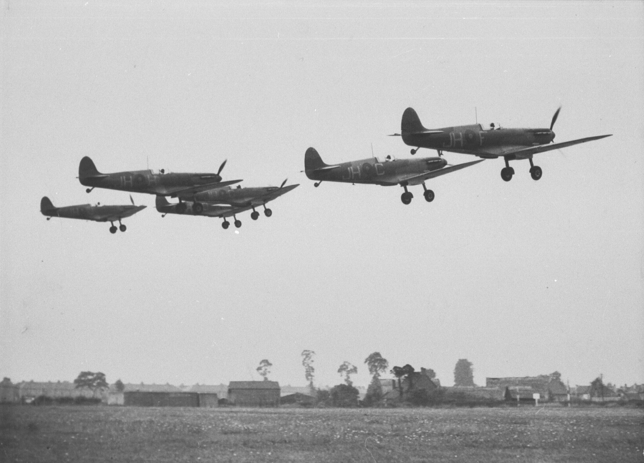 Spitfires of 74 Squadron JHF JHC JHH JHG taking off from RAF Hornchurch