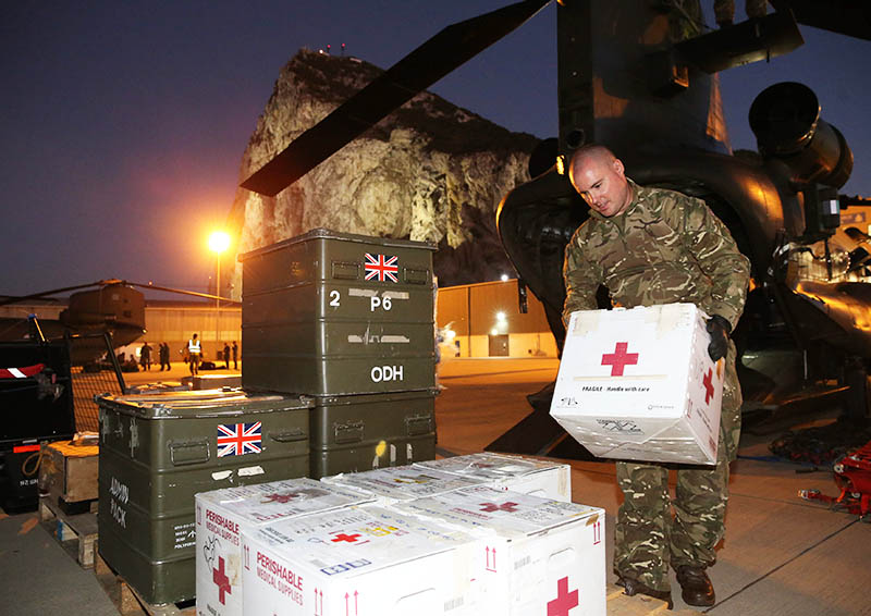 RAF personnel unload aid for Hurricane Irma victims